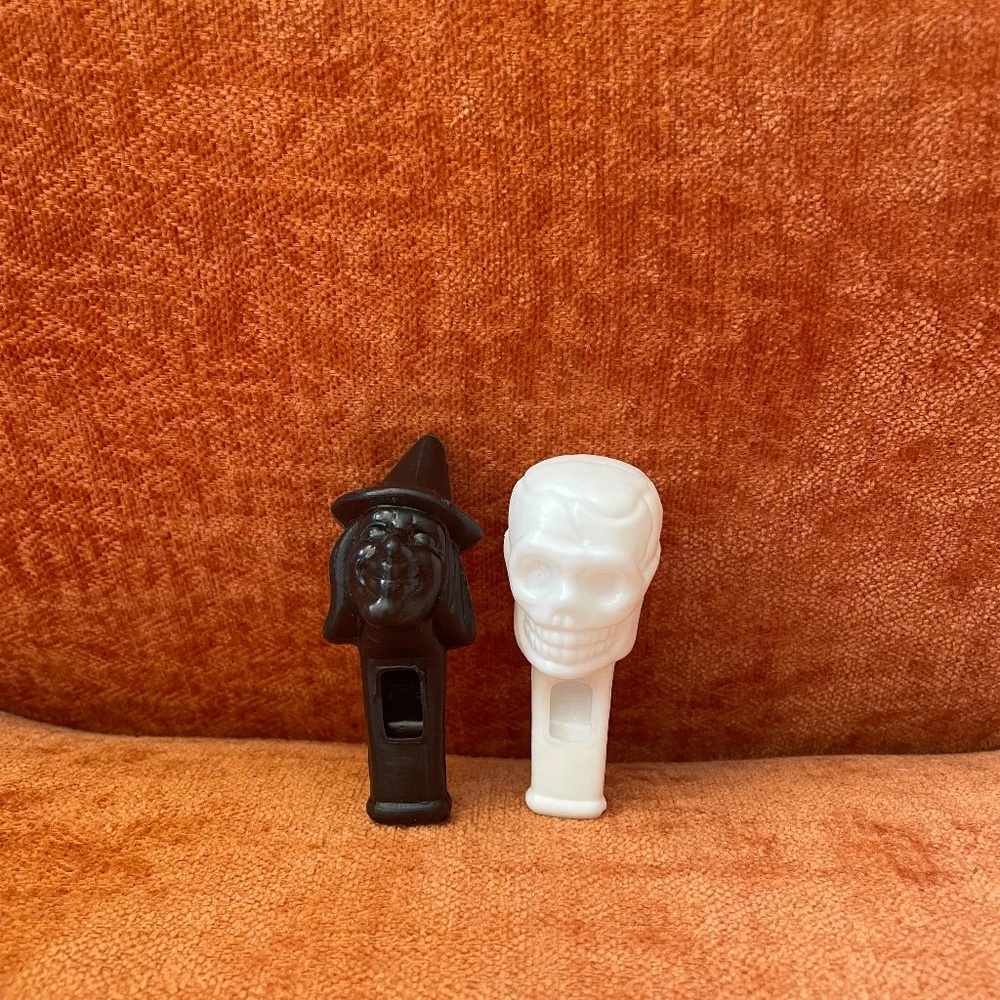 Two Vintage Plastic Halloween Whistles